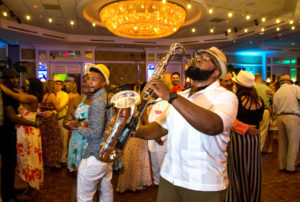 A solo musician- anything from a Saxophonist (pictured), to pianist, guitarist, or DJ. Photography by: PatrickSchneiderPhoto.com