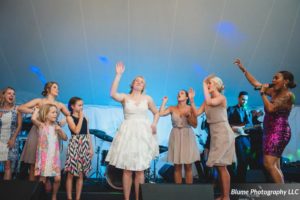 Live Exchange Party Music performing wedding music that got the bride on stage and dancing!